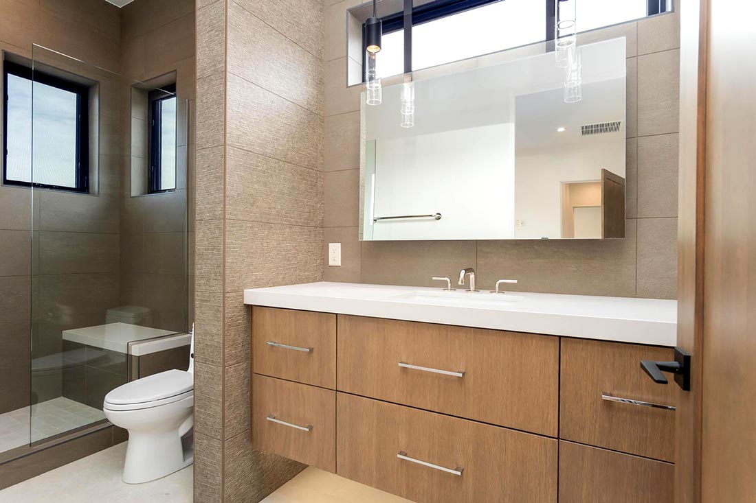 luxury bathroom remodel in Sedona with real wood cabinetry
